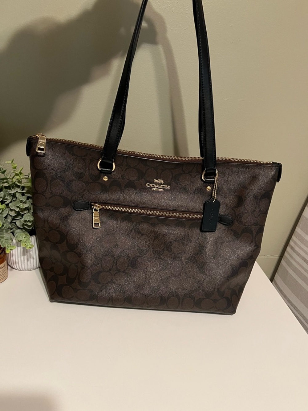 COACH Dark Brown Signature Canvas Tote with Black Straps
